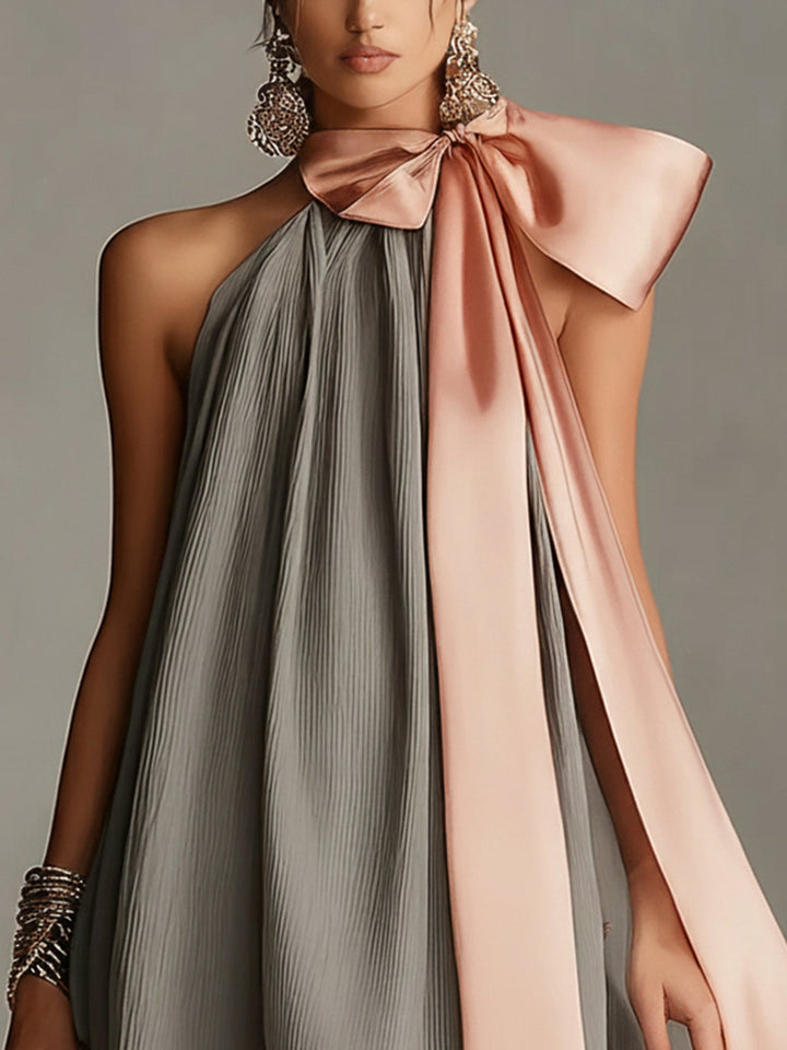 Natalia - Vestido mini gris de satén con cuello halter, lazo y ribete de encaje