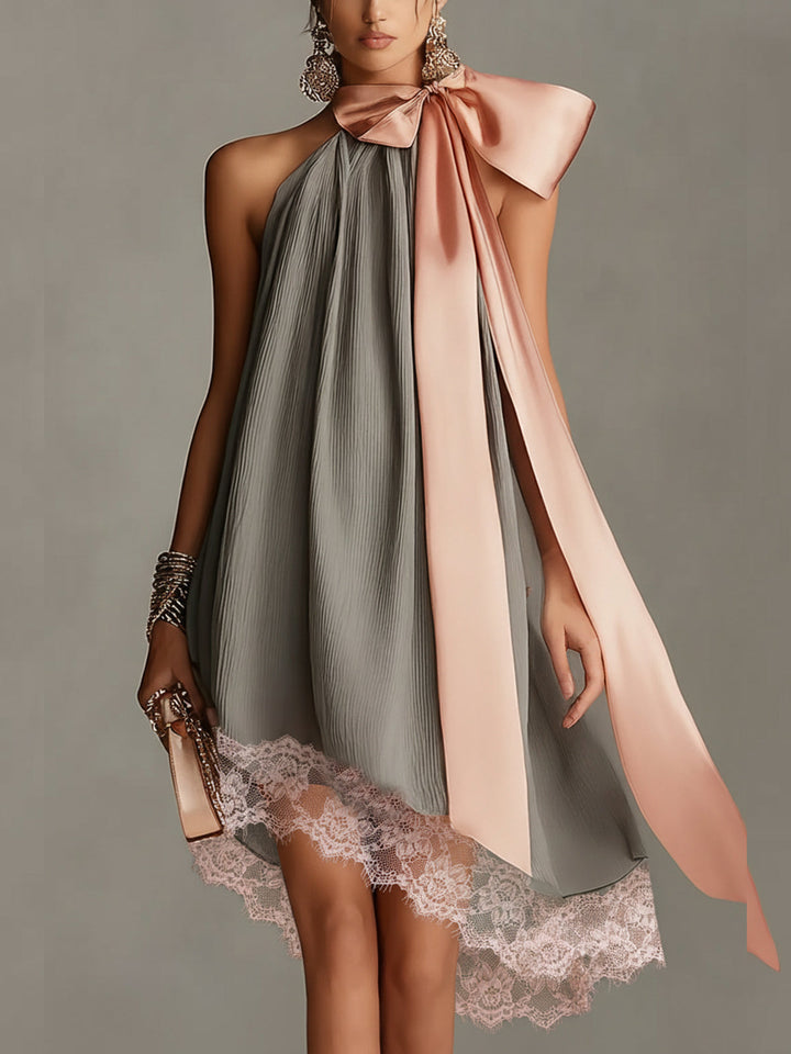 Natalia - Vestido mini gris de satén con cuello halter, lazo y ribete de encaje
